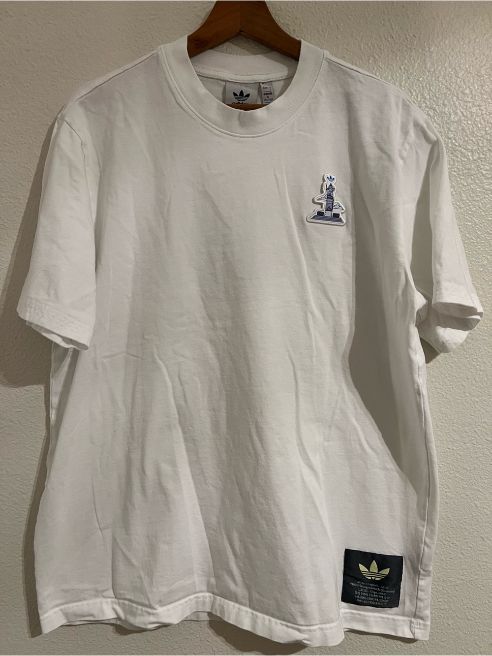 adidas Originals White Short-Sleeve Tee with Small Blue Chest Patch